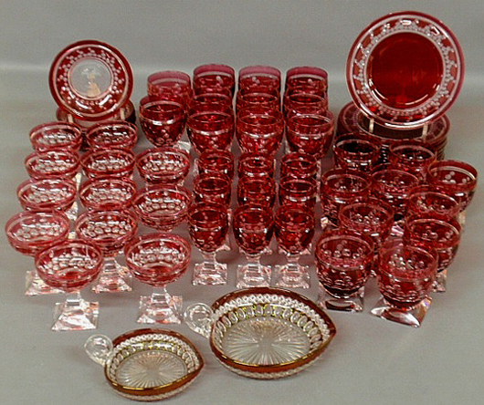 Set of Val St. Lambert cranberry crystal glassware. Estimate: $400-$600. Wiederseim Associates Inc. image.