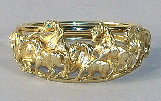 Gold equestrian bracelet, 14K. Woodbury Auction image.