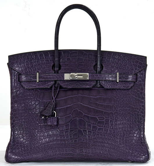 Hermes violet crocodile Birkin bag, 35 centimeter matte with palladium hardware; includes keys and outer box, 10 inches high, 14 inches wide, 7 inches deep. Abell Auction Co. image.