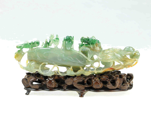 Extremely rare 18th/19th-century grade-A translucent jadeite carved insect and melon with stand. Insects on melon symbolize Five Fortunes. Scrollwork vines overall. Estimate $250,000-$350,000. Golden State Auction Gallery image.
