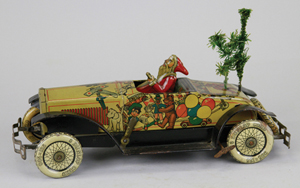 Top lot of the sale: circa-1928 Tippco tinplate Santa car with revolving Christmas feather tree, $28,910. Bertoia Auctions image.