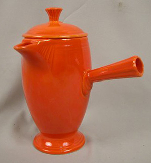 Homer Laughlin is the manufacturer of the famous Fiesta dinnerware. This vintage red demitasse coffeepot is a choice collector's item. Image courtesy LiveAuctioneers.com Archive and Strawser Auction Group.