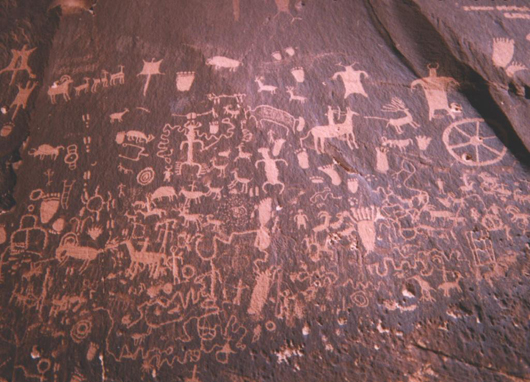 Shown here is an example of tribal petroglyphs on 'Newspaper Rock' near Canyonlands National Park, south of Moab, Utah. Photo by Dave Jenkins, licensed under the Creative Commons Attribution-Share Alike 3.0 Unported license.
