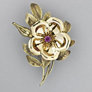 Tiffany & Co. bicolor gold ruby brooch, to be sold Dec. 9. Estimate: $2,000-$3,000. Rago Arts and Auction Center image.