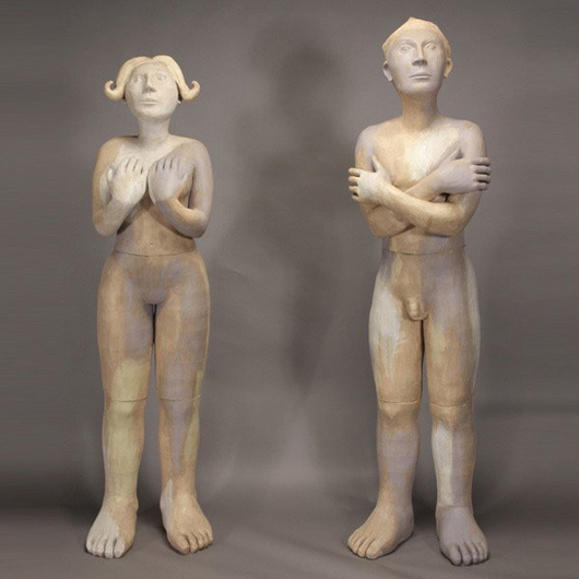 Two life-size ceramic figures of a man and a woman, est. $2,000-$3,000.