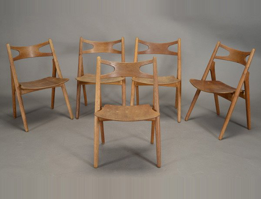 Set of five dining chairs Designed by Hans Wegner, est. $800-$1,200. Michaan's image.