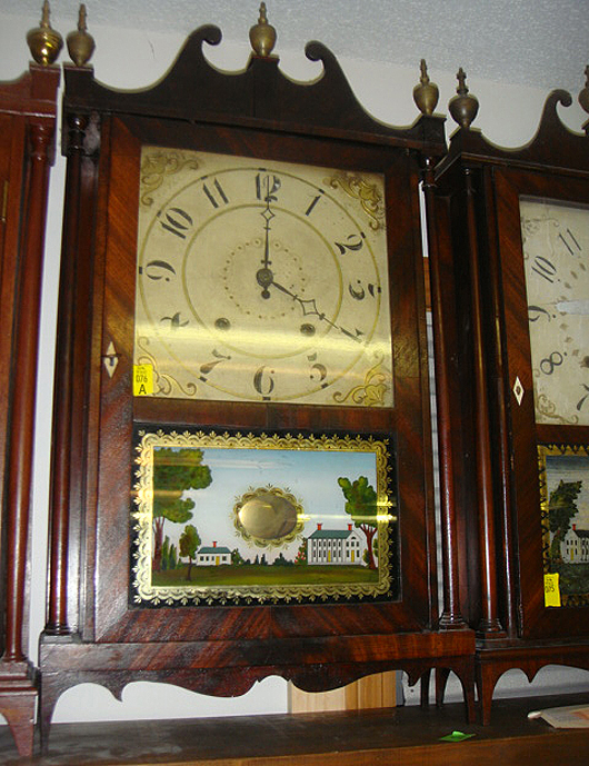 Antique pillar-and-scroll clocks by makers such as Eli Terry and Atkins & Downs were sold. Tim’s Inc. image.