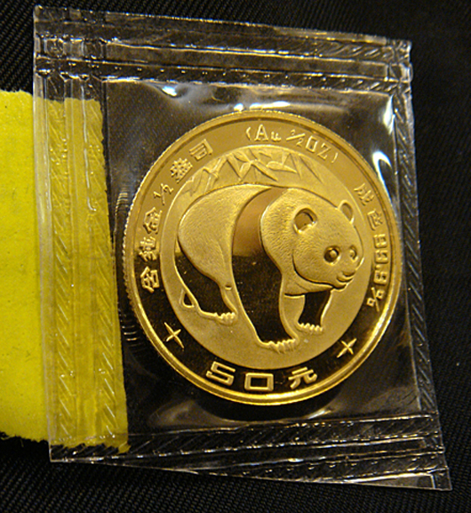 Dozens of gold and silver coins – like this Chinese Panda gold coin – came up for bid at the sale. Tim’s Inc. image.
