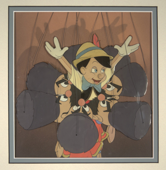 Pinocchio with marionettes in Walt Disney Productions 1940 'Pinocchio.' Hess Fine Auctions image. 