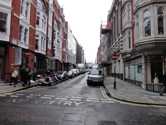 London's famous Cork Street, where dealers on the West side of the street (right) now seem relatively secure, while the East side remains under threat by property developers keen to develop the site, albeit at the expense of the art trade. Image Auction Central News.