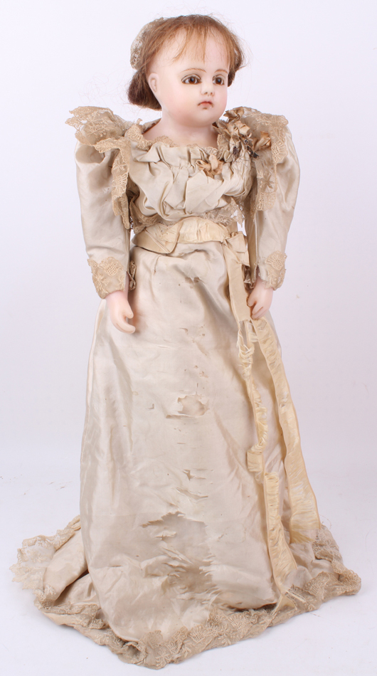 Poured wax bride doll, English, circa 1870, est. £700-£900. Chiswick Auctions image.