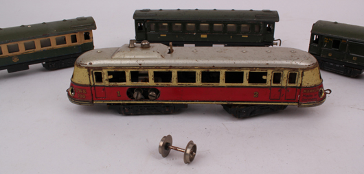 (Foreground) Marklin TWE 700 diesel rail car, German, circa 1900, est. £200 - £300. Chiswick Auctions image.
