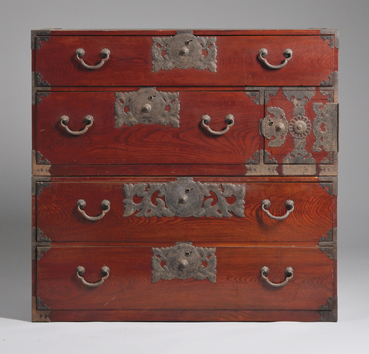 Two Korean iron-mounted pine tansu chests, each in two parts. Estimate: $400-$600. Skinner Inc. image.