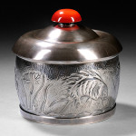Henry Petzal silversmith (1906-2002) covered box, handwrought sterling silver and carnelian. Estimate: $1,000-$1,500. Skinner Inc. image.
