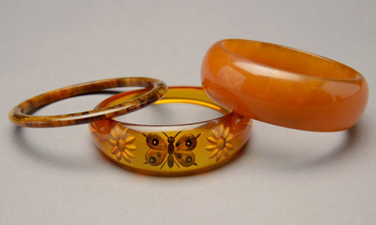 Collection of three Bakelite bangles. Price realized: $129.80. Michaan's Auctions image.