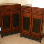 Pair of Chinese Qing elm and yellow wood side cabinets. Ravenswick image.