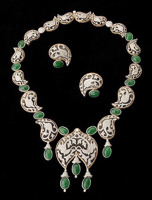 Jade, diamond, 18K gold jewelry suite. Sold for $15,340. . Michaan’s Auctions image.