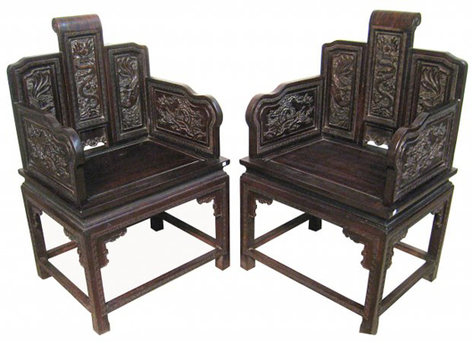Gorgeous pair of Chinese zitan chairs with fine and sophisticated carving (est. $5,000-$1,000). Gordon S. Converse & Co. image.