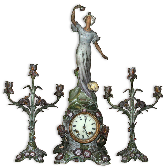 Three-piece original Ansonia clock set, mint condition. GovernmentAuctions image.