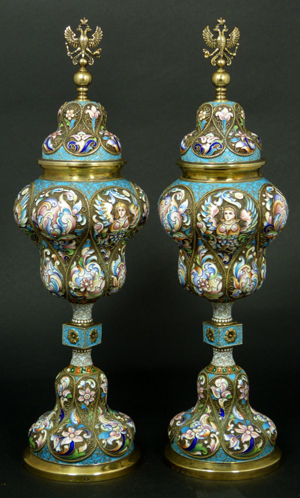 Stunning pair of Russian enameled silver lidded urns with winged angel design, scrolled flowers. Elite Decorative Arts image.