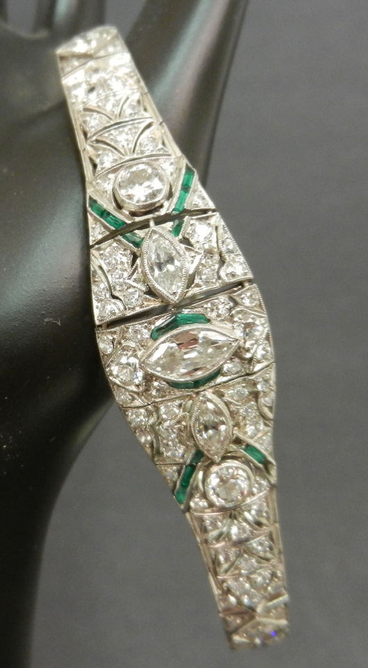 Art Deco platinum diamond and emerald bracelet, approximately 5 1/2 carats, TCW, unmarked, tests platinum, weight 29.2 grams/18.8 dwt, circa 1920. Est. $5,000-$8,000. Stephenson’s Auctioneers image.