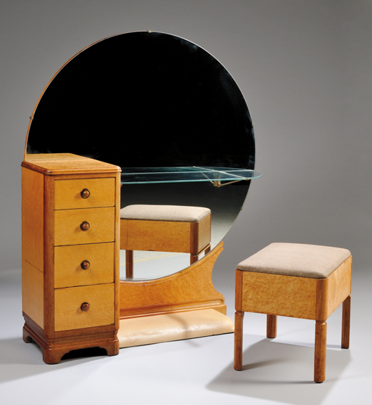 Art Deco bird's-eye maple veneer and maple mirrored vanity and upholstered lift-seat stool, 54 3/4 inches high by 46 3/4 inches wide by 14 1/2 inches deep. Estimate: $400-$600. Skinner Inc. image.