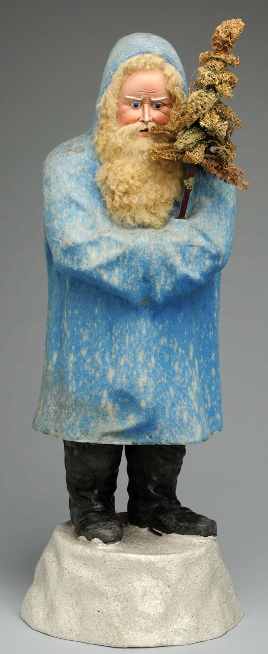 Blue-coated belsnickel, 30 inches high, with rabbit-fur beard and holding feather tree, $6,500. Morphy Auctions image.