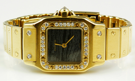 Cartier watch, 18K yellow gold with 32 diamonds, working condition unknown. Price realized: $5,000. Kaminski Auctions image.