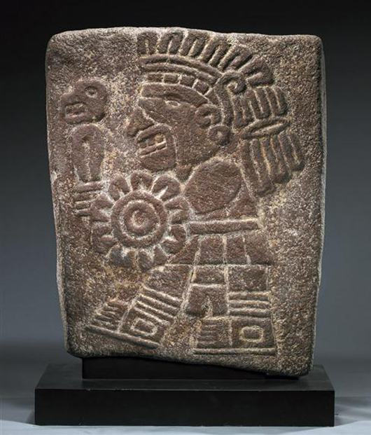 Mixtec stone stele depicting a running warrior, ex-museum collection, Mexico, 1200-1300 CE. Estimate $20,000-$30,000. Antiquities Saleroom image.