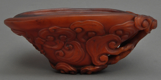 Chinese horn carved libation cup. Zanaba Auctions image.