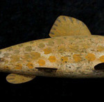 Ice fish decoy, possibly late 19th century, carved wood body with metal fins and tail. Est. $200-$250. Photo: TAC Estate Auctions Inc.