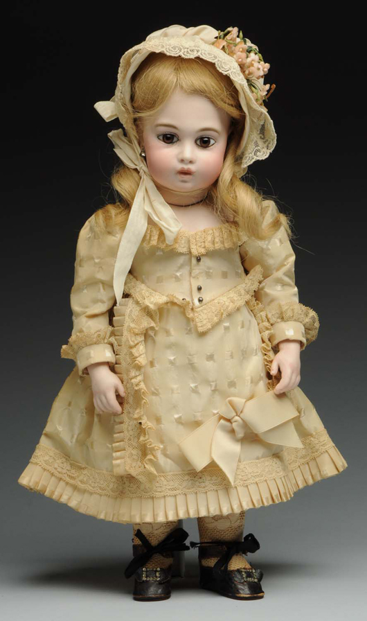 Circle and Crescent Bru Jne 4 bisque bebe doll, 15 inches, $10,800. Morphy Auctions image.