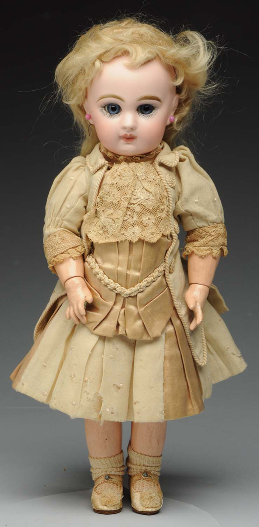 French bisque bebe doll stamped ‘Depose Tete Jumeau Bte SGDG 5,’ 14 inches, $5,400. Morphy Auctions image.