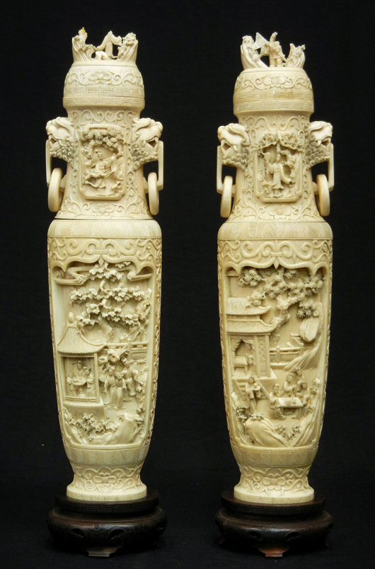 Pair of Chinese carved ivory figural covered urns decorated with figural village scenes, foo dogs, circa 1890-1920, ex collection of Oliver Smalley, Epsom, England; $6,490. Stephenson’s Auctioneers image.