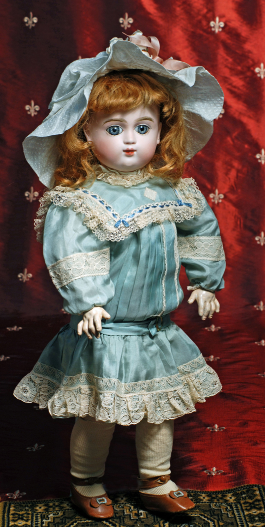 Splendid French bisque bebe by mystery maker, marked ‘F’ and thought to be from the porcelain firm of Frayon, who created heads for such firms as Steiner and Halopeau. Frasher’s Doll Auctions image.