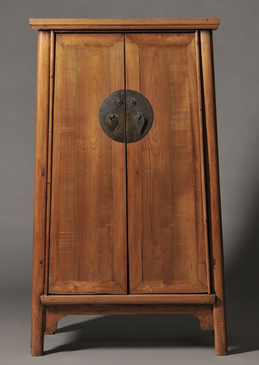 Tapered cabinet, china, 20th century, shelved interior with a single row of drawers. Estimate: $1,000-$1,200. Skinner Inc. image.