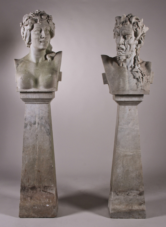 Pair of Bacchanalian 2-piece marble garden herms (boundary markers), 19th century, depicting horned satyr and nude maiden, each having a total height of 62 in., est. $6,000-$9,000. Myers Fine Art image.
