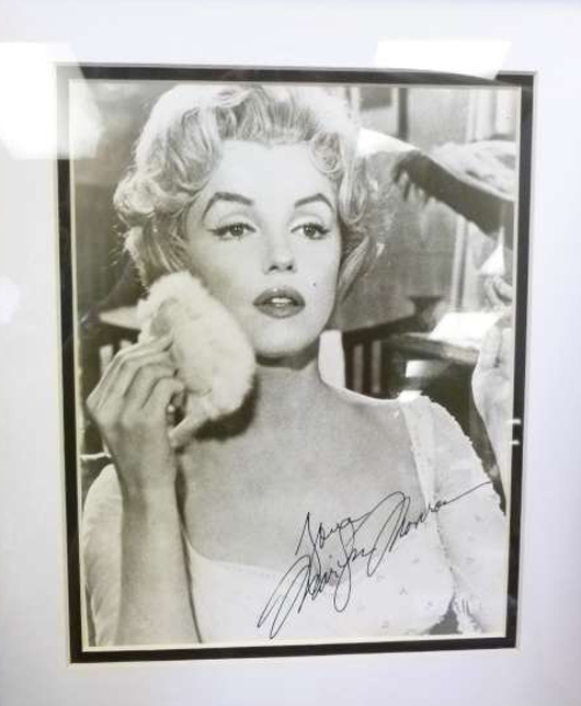 Marilyn Monroe autographed picture. America's Best Auctioneer image.