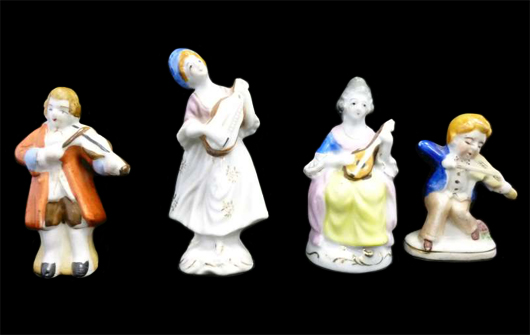 Group of porcelain figures. America's Best Auctioneer image.