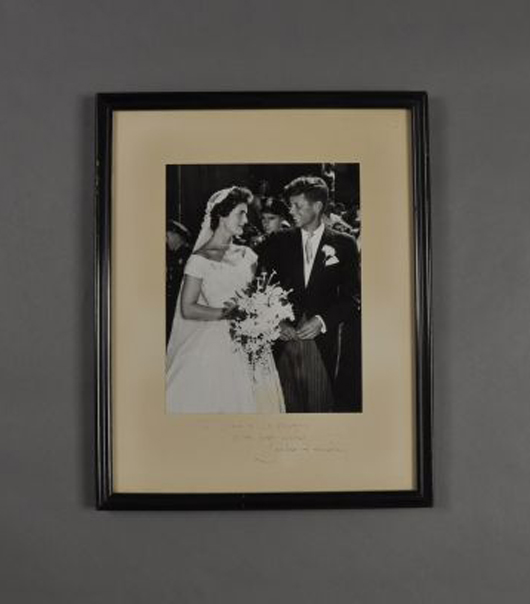 John F. Kennedy and Jacqueline on their wedding day. John McInnis Auctioneers image.