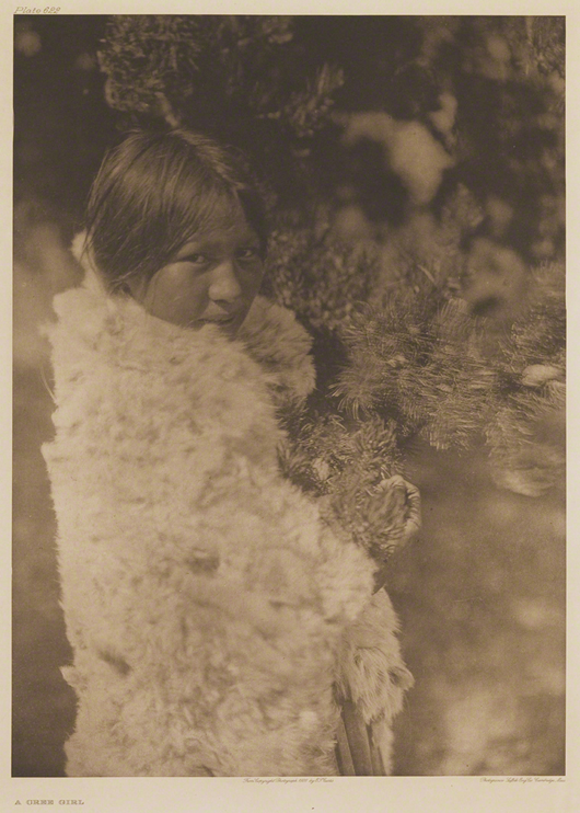 Curtis was able to establish a rapport with his subjects, which made possible relaxed and candid portraits, such as this image of ‘A Cree Girl’ wrapped in her rabbit fur cloak, on view at the St. Louis Art Museum. Courtesy St. Louis Art Museum.