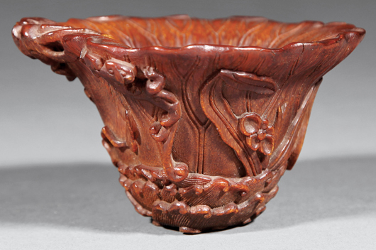Chinese carved rhinoceros horn libation cup, 17th/18th century, 2 1/2 inches high. Provenance: George W. Headley III, circa 1970; the Headley-Whitney Museum, Lexington, Ky. Estimate: $7,000-$9,000. Neal Auction Co. image.