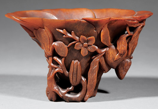 Chinese carved rhinoceros horn libation cup, 18th century, 4 1/8 inches high Provenance: George W. Headley III, circa 1970; to the Headley-Whitney Museum, Lexington, Ky. Estimate: $8,000-$12,000. Neal Auction Co. image.