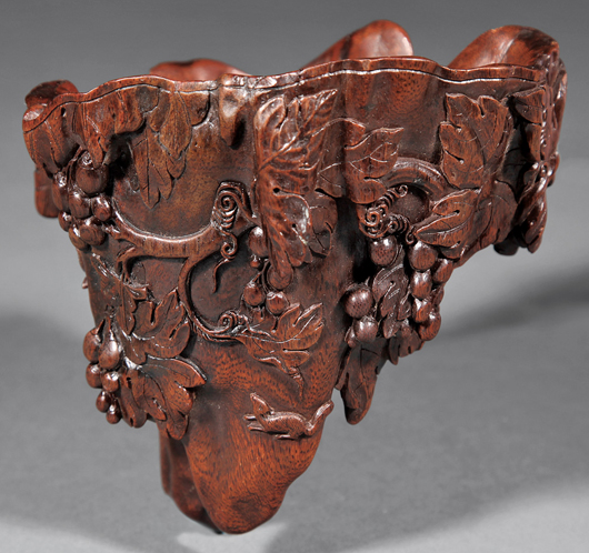 Rare Chinese ‘Eccentric’ carved hardwood libation cup, 17th/18th century, 4 1/4 inches high. Provenance: George W. Headley III, 1971; the Headley-Whitney Museum, Lexington, Ky. Exhibited: George de Menasce Collection, Spink & Son, London, May 10-26, 1971. Estimate: $2,500-$3,500. Neal Auction Co. image.