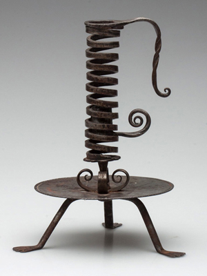 Samuel Yellin (1885-1940) Arts & Crafts wrought iron candlestick. Estimate: $800-$1,200. Courtesy of Jeffrey S. Evans & Associates Inc.