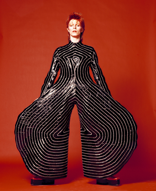 Striped bodysuit for 'Aladdin Sane' tour. Design by Kansai Yamamoto. Photograph by Masayoshi Sukita, 1973. Credit line: © Duffy Archive. Special terms: David Bowie is. Courtesy of Victoria and Albert Museum.