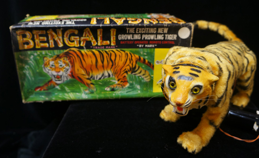 From the selection of toys to be auctioned, a Marx battery-operated Bengali Tiger with original box. Tonya A. Cameron Auctions image.