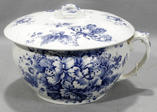 An English blue and white demiporcelain chamber pot. Image courtesy of LiveAuctioneers.com Archive and DuMouchelles.
