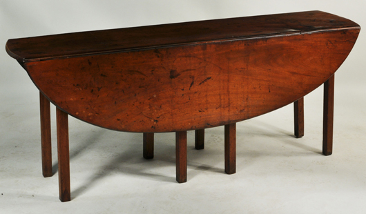 Georgian mahogany gateleg wake table. Price realized: $3,840. Woodbury Auction image.