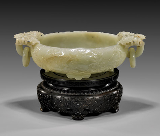 18th-century carved celadon jade Chinese marriage bowl with openwork bats and flowers on handles; relief gourds and foliage on vessel create ‘good fortune’ rebus. Estimate: $40,000-$50,000. I.M. Chait image.